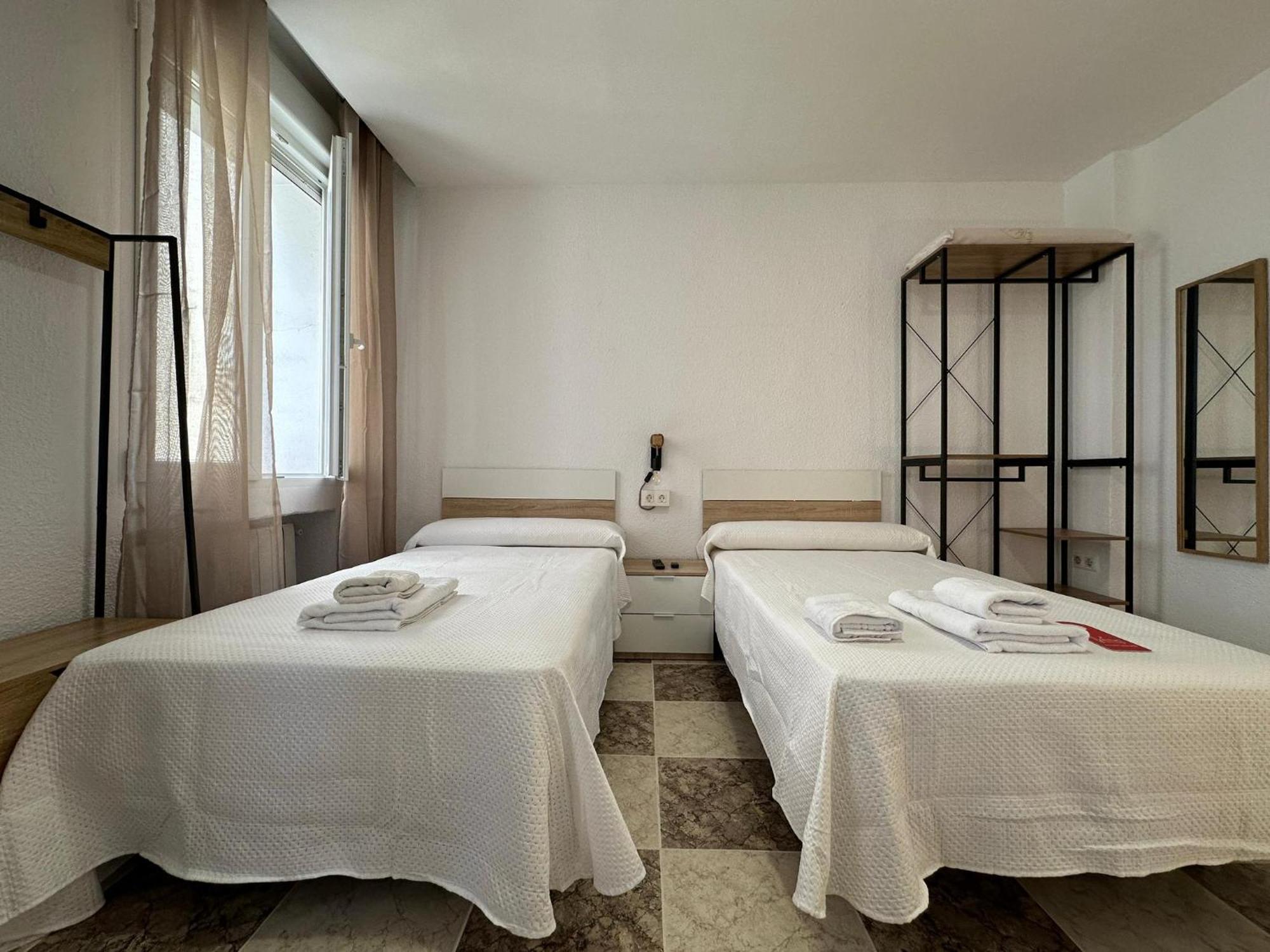 Chambre Triple avec Salle de Bains Commune